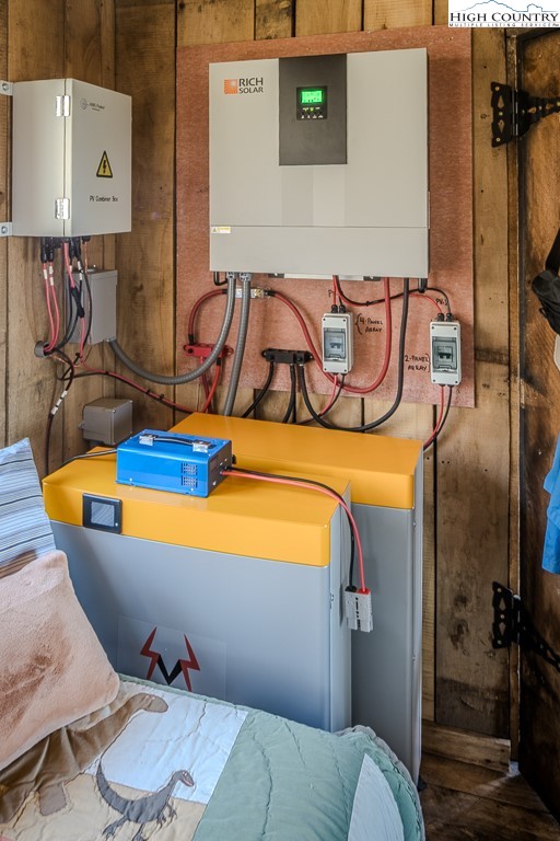 Jerry's Creek Road Newland, NC 28657 - Photo 28 of 49 a bathroom with a tub sink and mirror