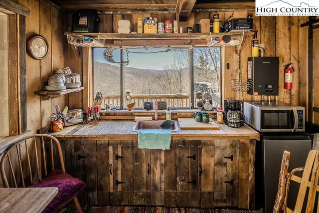 a bench sitting in middle of the ocean