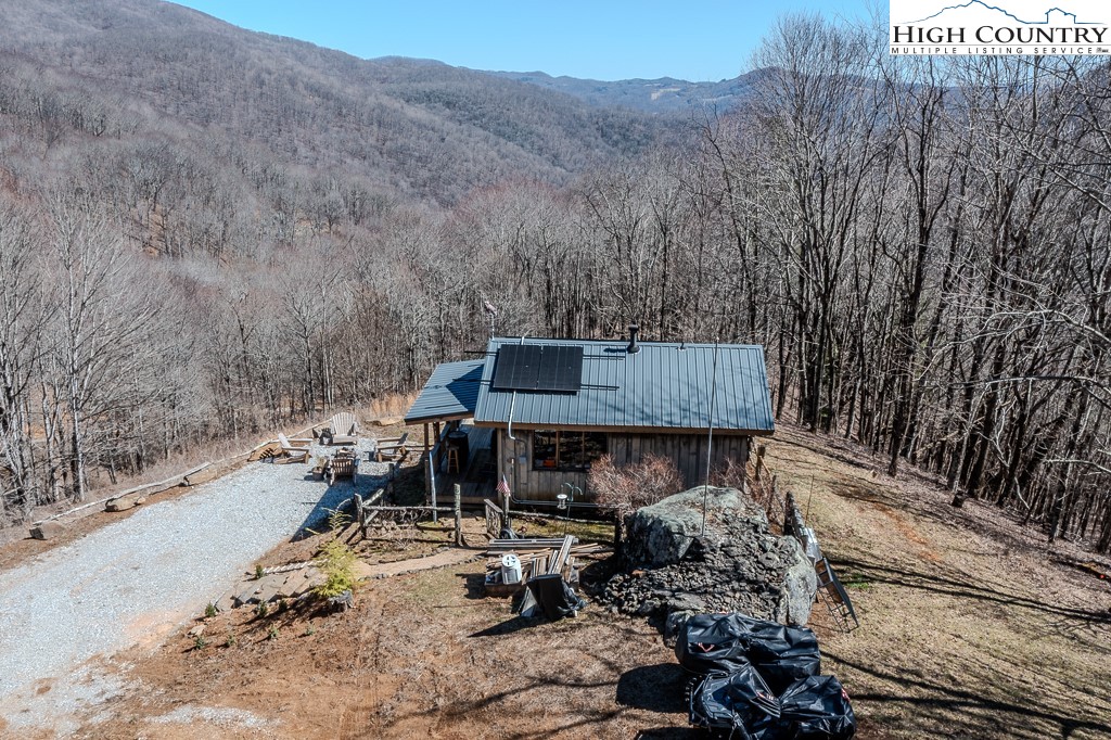 Jerry's Creek Road Newland, NC 28657 - Photo 40 of 49 a view of house with backyard space and sitting area