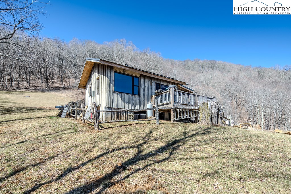 Jerry's Creek Road Newland, NC 28657 - Photo 7 of 49 a view of a house with a snow on the road