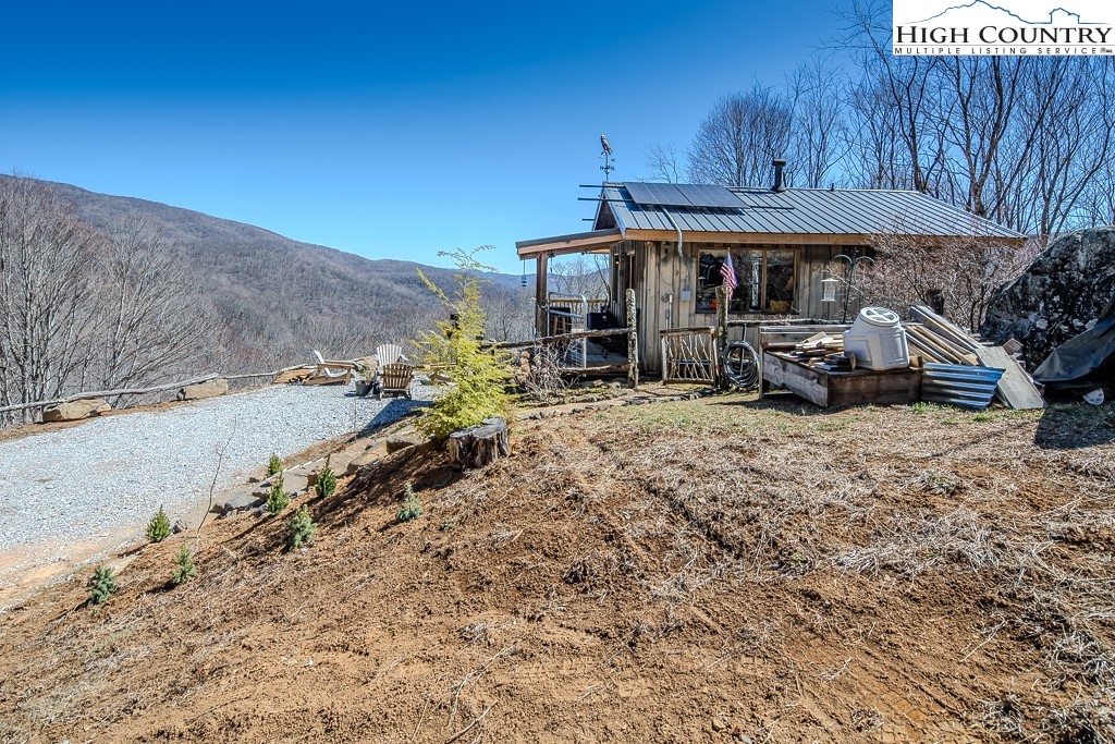 Jerry's Creek Road Newland, NC 28657 - Photo 9 of 49 a view of a chairs and table in the patio