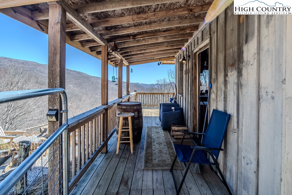 Jerry's Creek Road Newland, NC 28657 - Photo 10 of 49 a view of a balcony with chairs