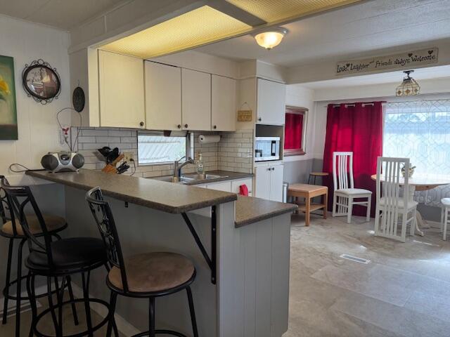 2023 St Lucie Boulevard, Unit 69 Fort Pierce, FL 34946 - Photo 2 of 20 a view of kitchen with breakfast area