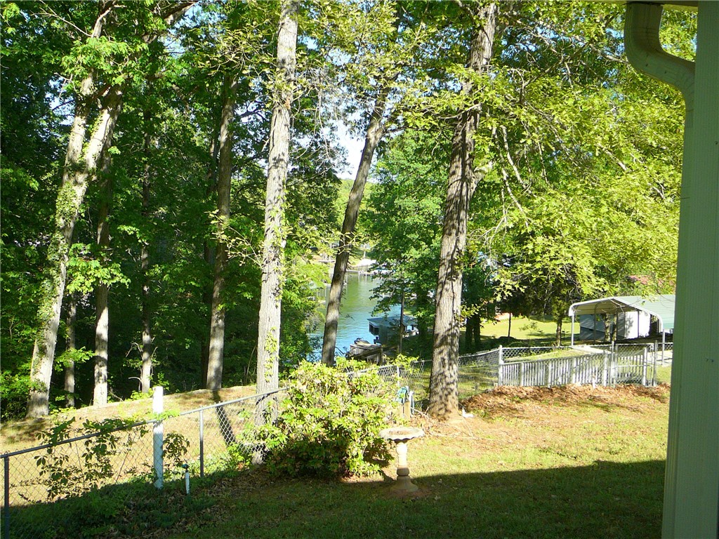 11 Waterford Point Iva, SC 29655 - Photo 26 of 27 This lush landscape offers serene water views and a private waterfront setting.