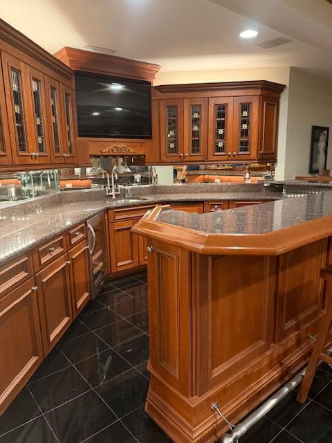 9261 Ruth Court St. John, IN 46373 - Photo 35 of 48 a kitchen with stainless steel appliances granite countertop a stove and a sink