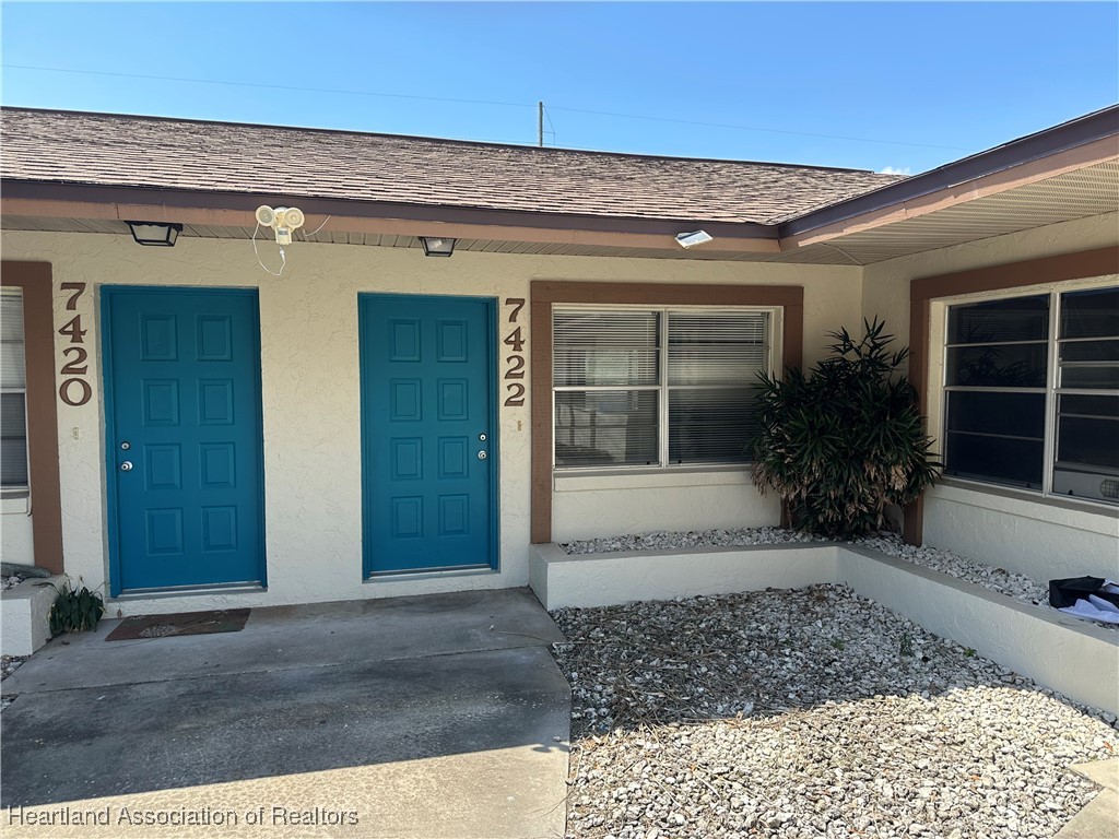 7422 Valencia Road Sebring, FL 33876 - Photo 2 of 15 front view of a house