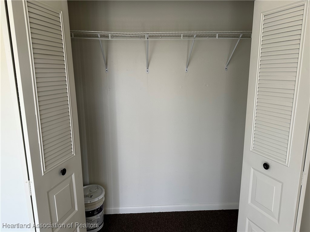 7422 Valencia Road Sebring, FL 33876 - Photo 8 of 15 a bathroom with a shower and toilet