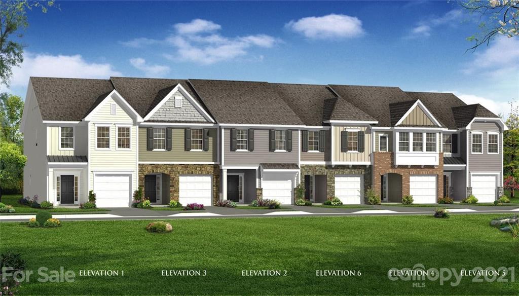 2038 Suttonview Road, Unit 688 Fort Mill, SC 29708 - Photo 2 of 12 a front view of a house with a yard