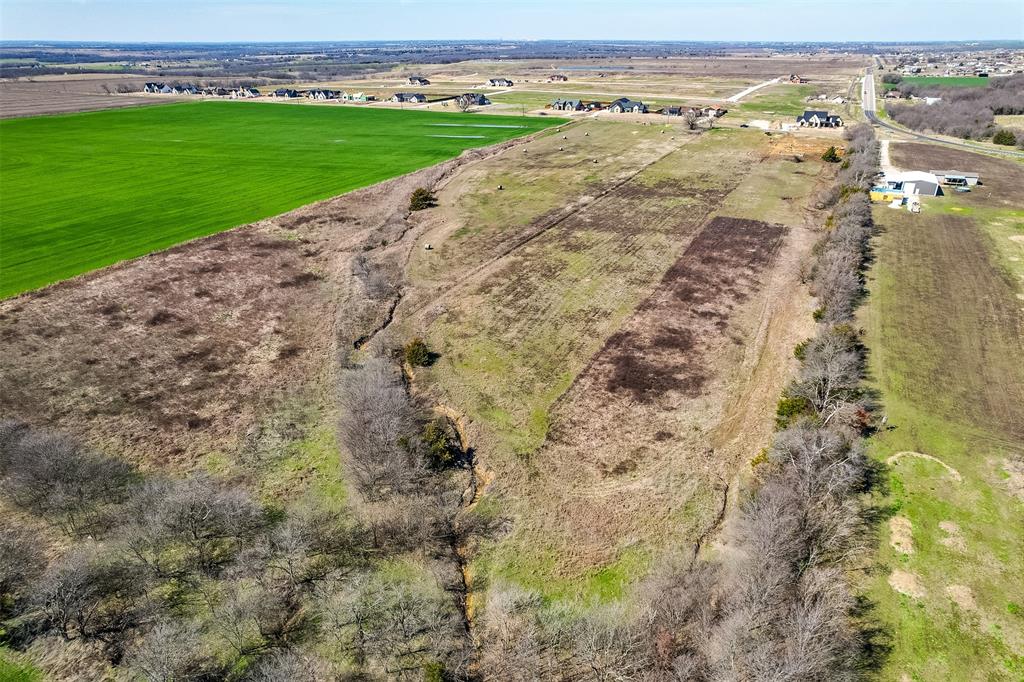 Lot 2-block Ozro Road Maypearl, TX 76064 - Photo 11 of 18 a view of a city with an ocean beach