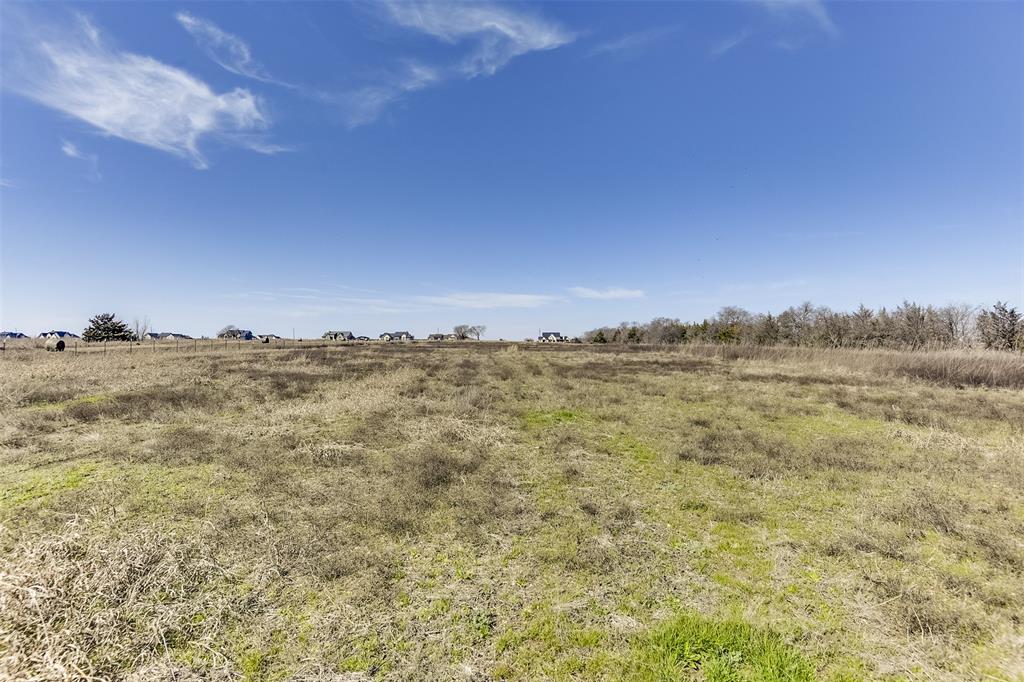 Lot 2-block Ozro Road Maypearl, TX 76064 - Photo 15 of 18 a view of a large building with mountains in the background