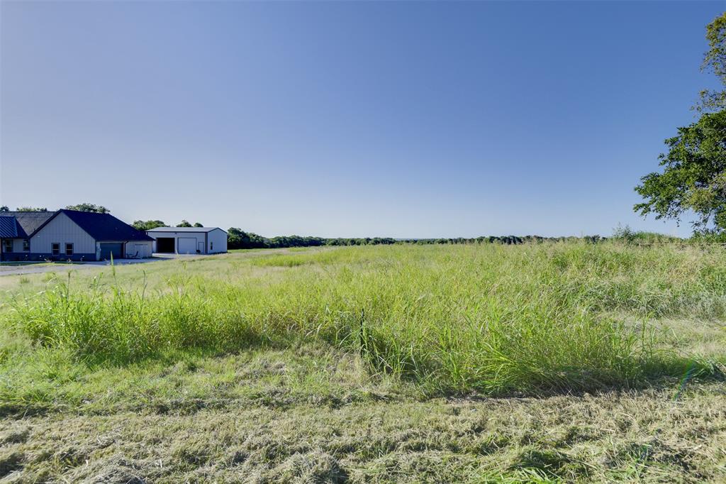 Lot 2-block Ozro Road Maypearl, TX 76064 - Photo 6 of 18 a view of a field with an ocean view