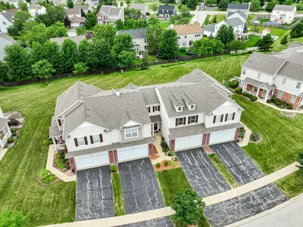 an aerial view of a house having big yard