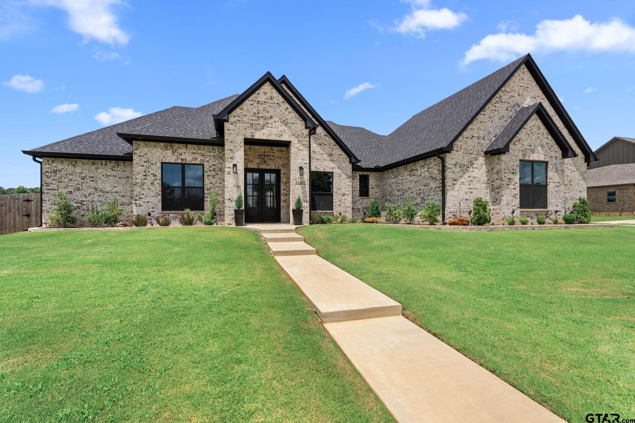 12293 Harlon Street Flint, TX 75762 - Photo 2 of 33 a front view of house with yard and green space