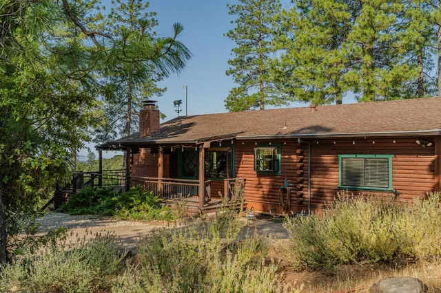 a view of a house that has a patio