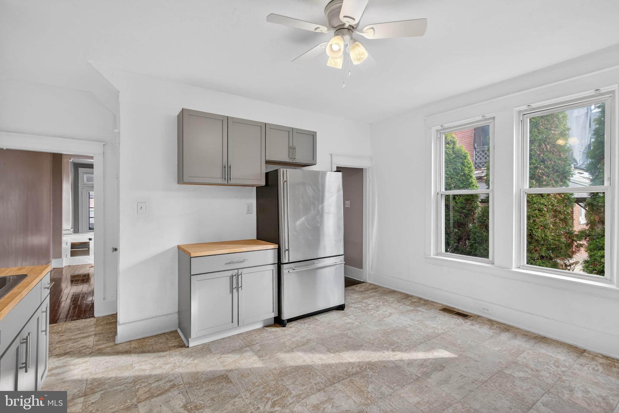 202 South Main Street Red Lion, PA 17356 - Photo 11 of 39 a kitchen with stainless steel appliances granite countertop a refrigerator and a sink