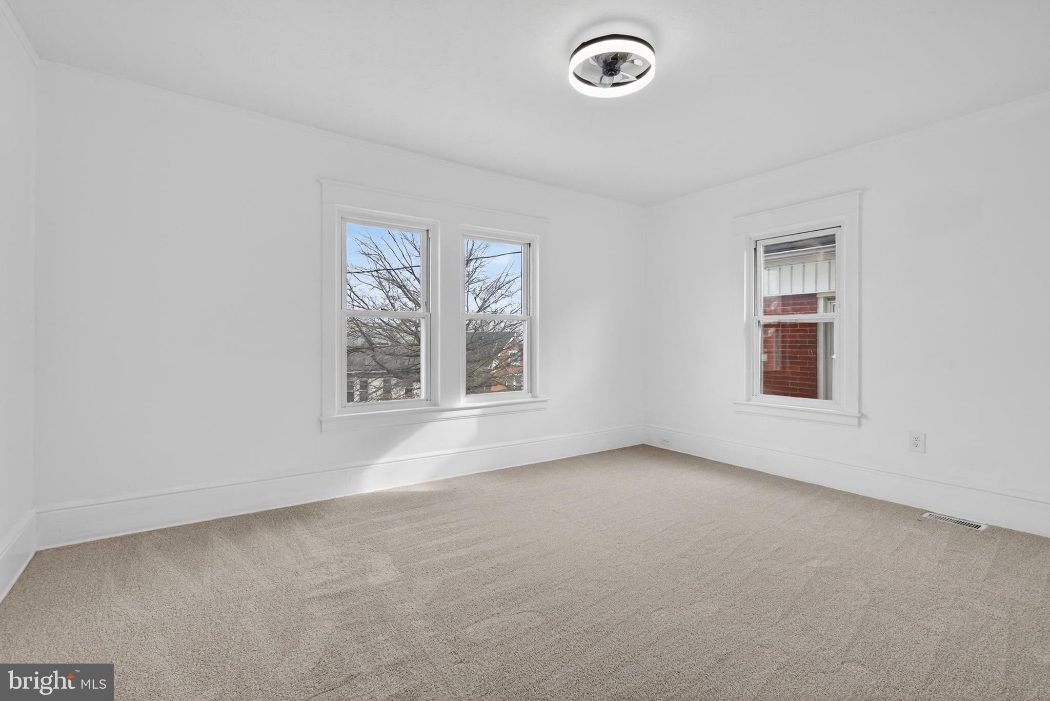 202 South Main Street Red Lion, PA 17356 - Photo 18 of 39 an empty room with windows