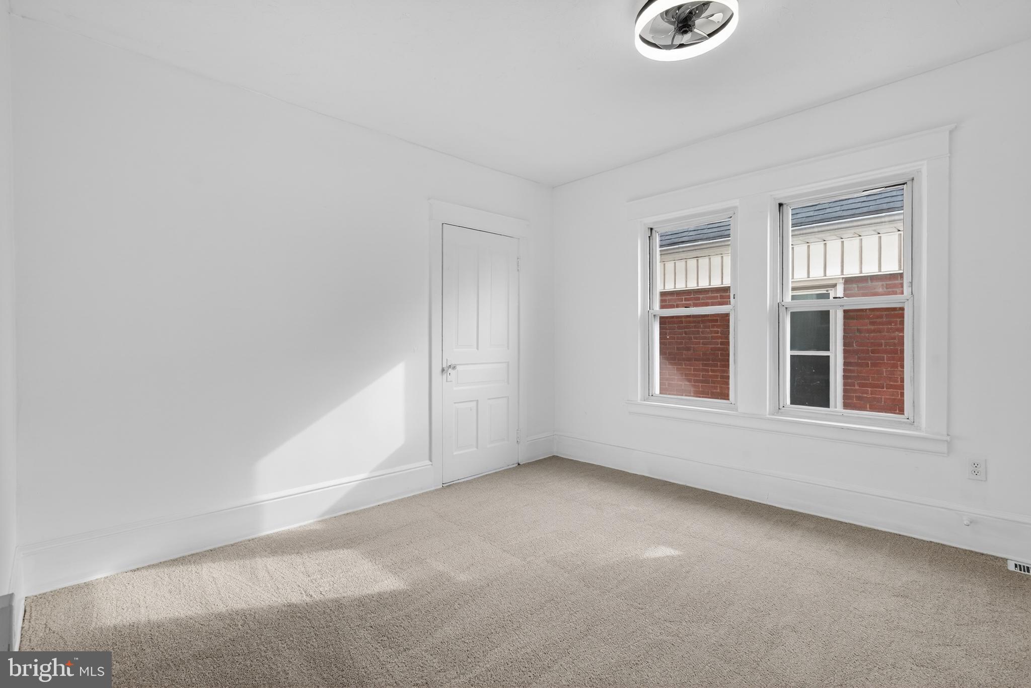 202 South Main Street Red Lion, PA 17356 - Photo 20 of 39 an empty room with windows