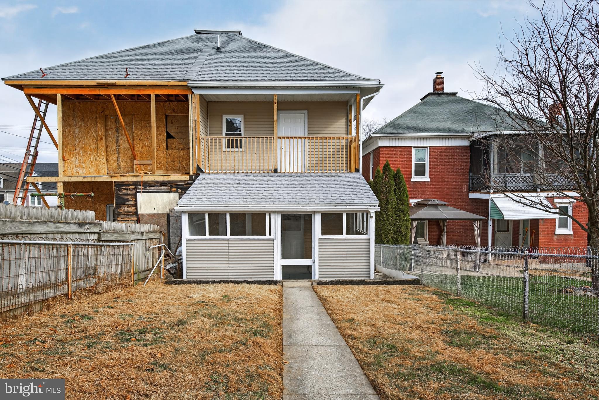 202 South Main Street Red Lion, PA 17356 - Photo 37 of 39 a front view of a house with garden