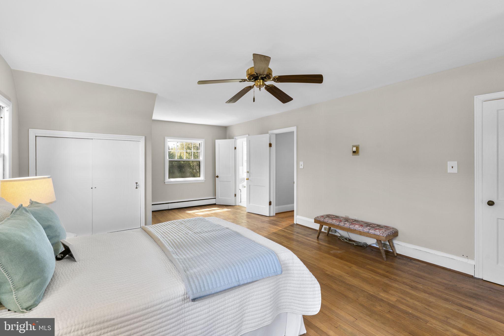 211 West Maple Road Linthicum Heights, MD 21090 - Photo 19 of 44 Spacious primary bedroom w/attached bathroom