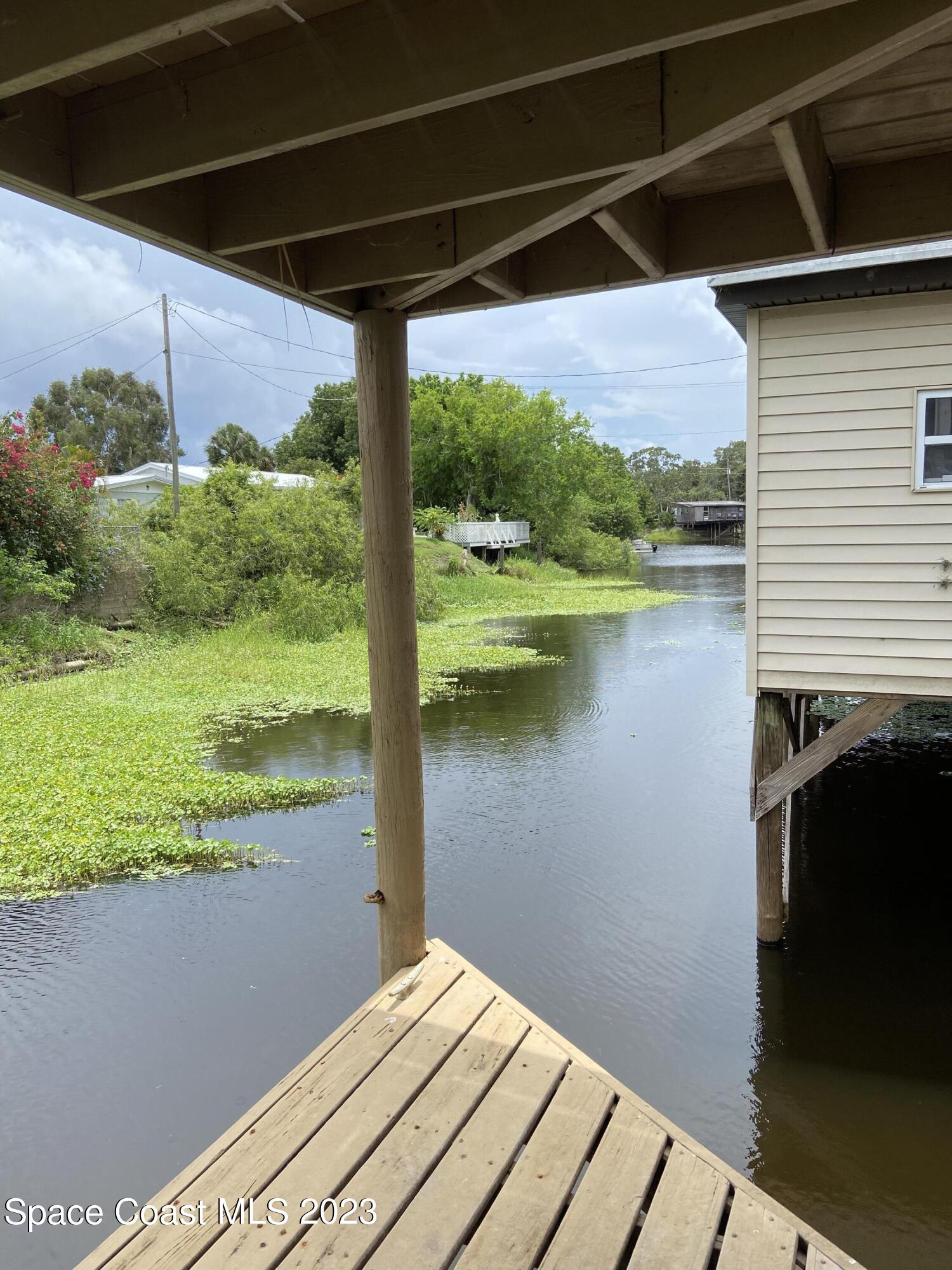 5757 Lake Poinsett Road Cocoa, FL 32926 - Photo 30 of 43 a view of a lake from a balcony
