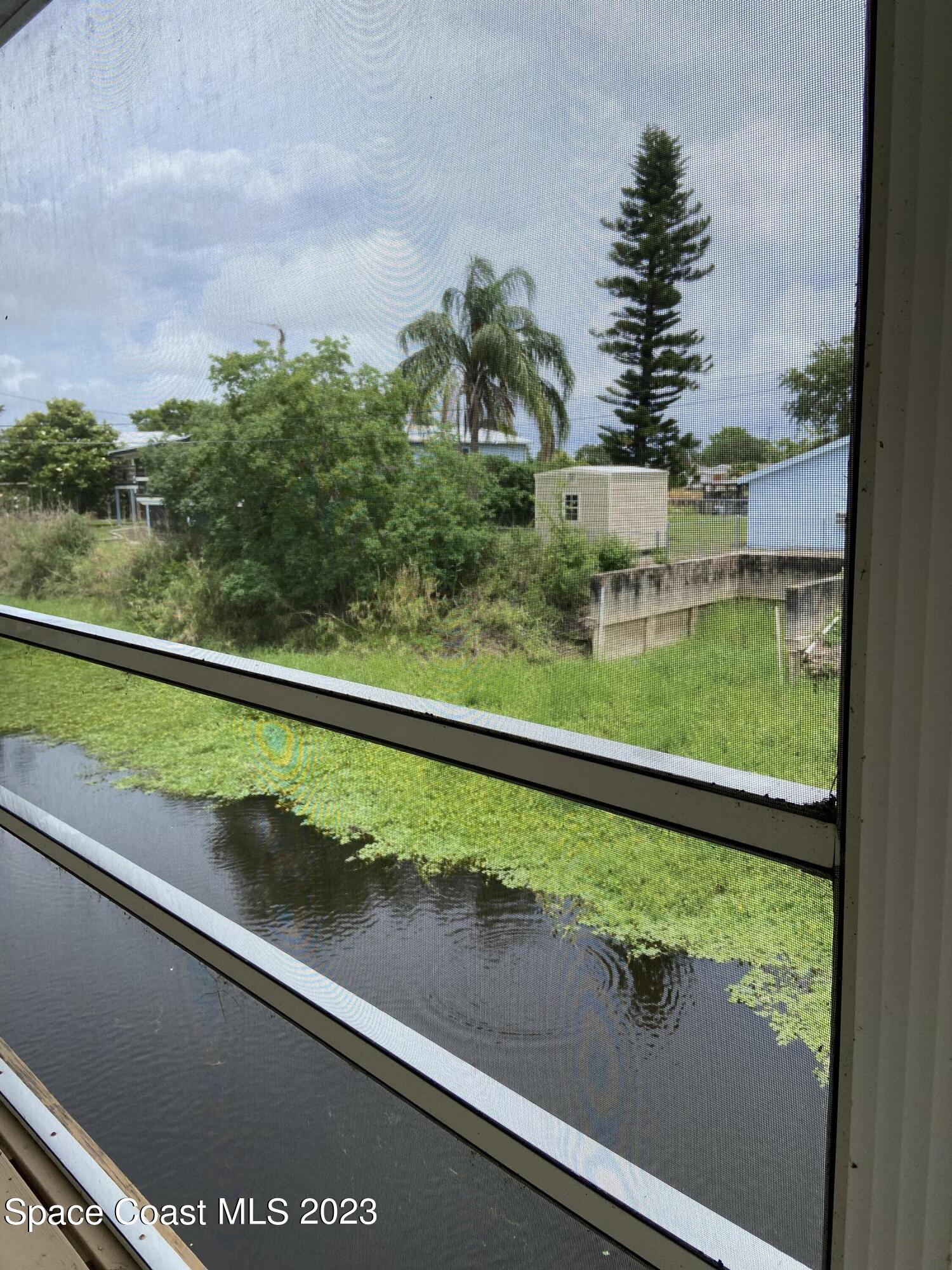 5757 Lake Poinsett Road Cocoa, FL 32926 - Photo 42 of 43 a view of swimming pool from a window