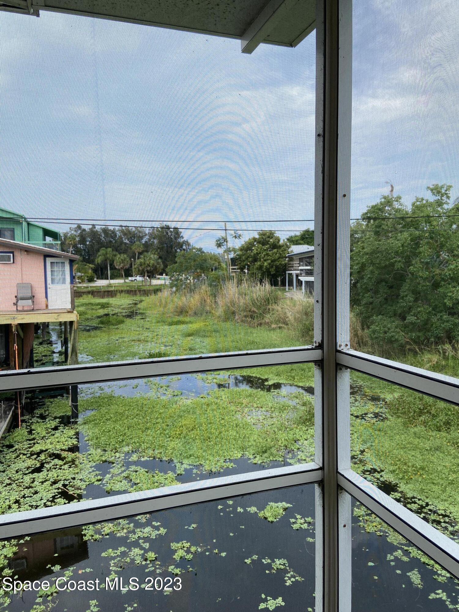 5757 Lake Poinsett Road Cocoa, FL 32926 - Photo 7 of 43 a view of outdoor space with a lake view