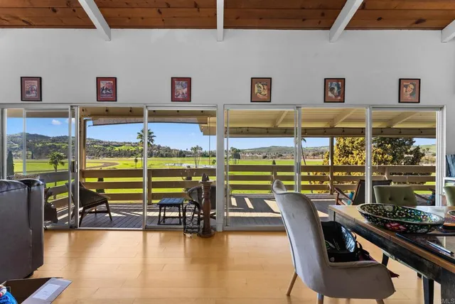 a room with lots of chairs and a table