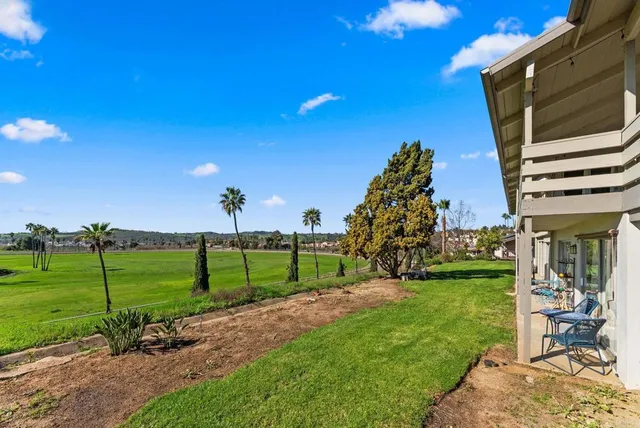 a view of a park with a slide