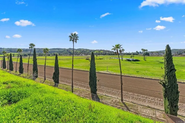 a front view of a house with sitting area