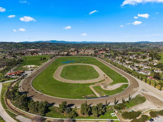 a view of a swimming pool with a balcony