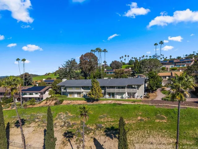 a view of a water fountain in front of building
