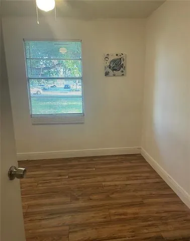 a view of a room that has a window in it