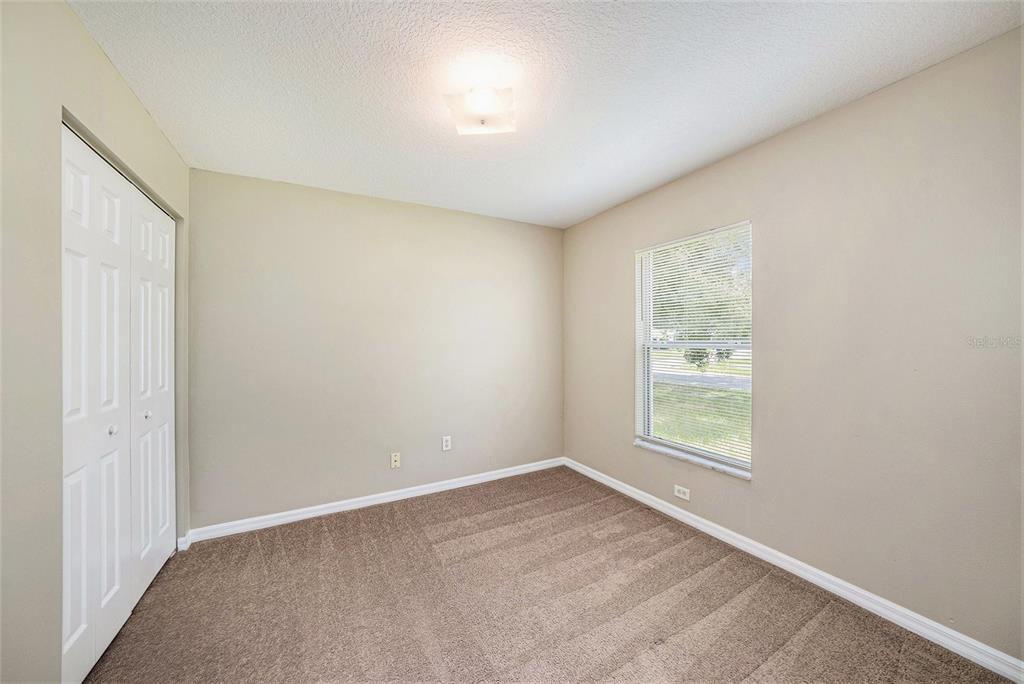 5850 13th Avenue New Port Richey, FL 34652 - Photo 11 of 15 an empty room with windows