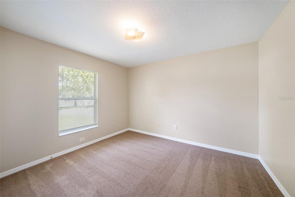 5850 13th Avenue New Port Richey, FL 34652 - Photo 12 of 15 an empty room with a window