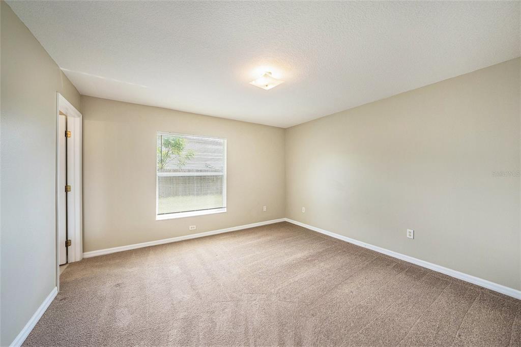 5850 13th Avenue New Port Richey, FL 34652 - Photo 9 of 15 an empty room with windows