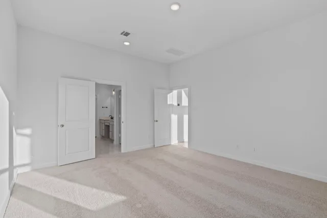 a bathroom with a sink double vanity and shower