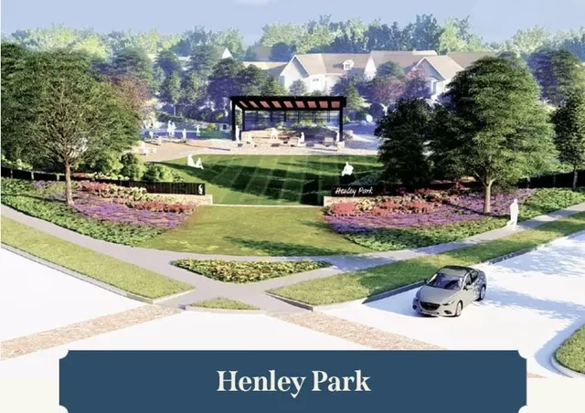 a view of a swimming pool with lawn chairs