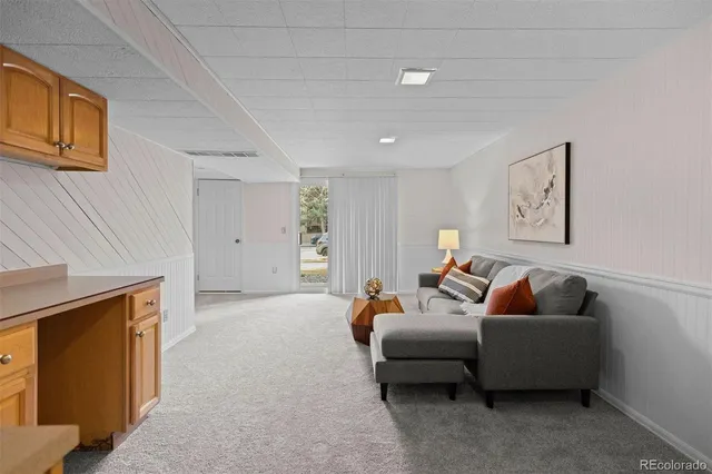 a living room with furniture and a couch