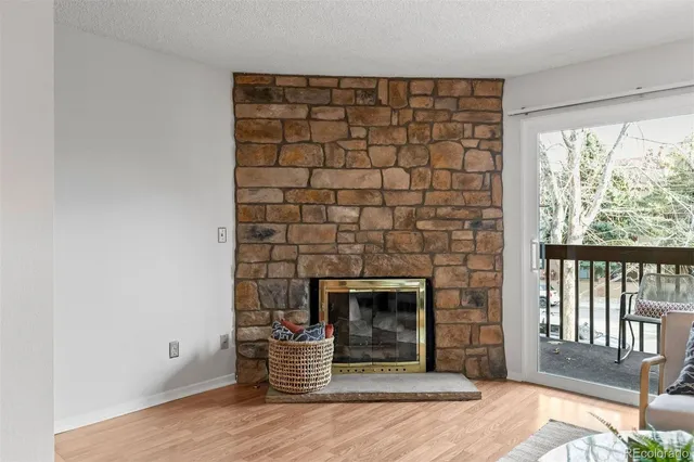 a living room with a fireplace