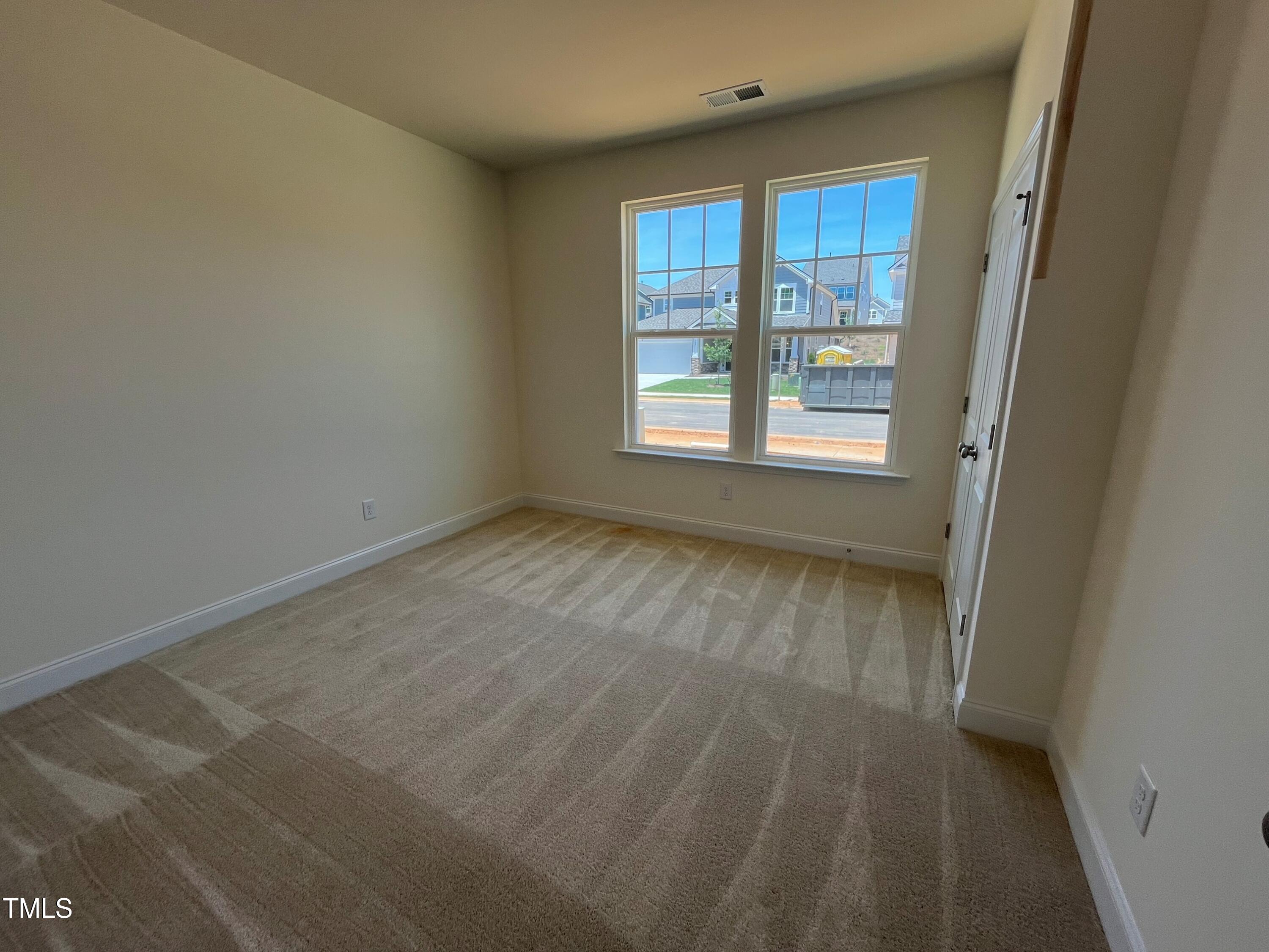 798 Old Station Pointe Angier, NC 27501 - Photo 3 of 19 a view of an empty room with a window