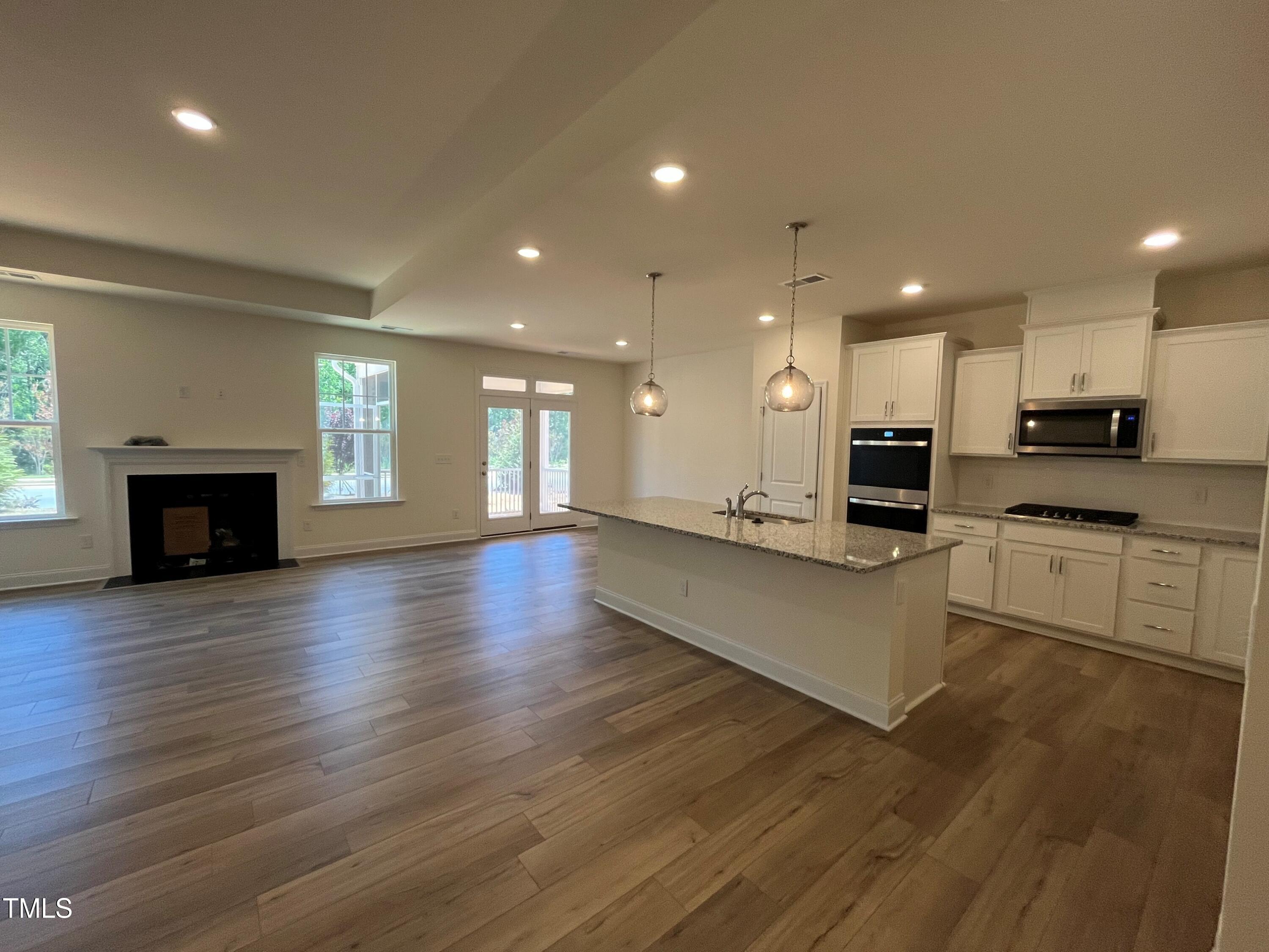 798 Old Station Pointe Angier, NC 27501 - Photo 7 of 19 Family Room/Kitchen