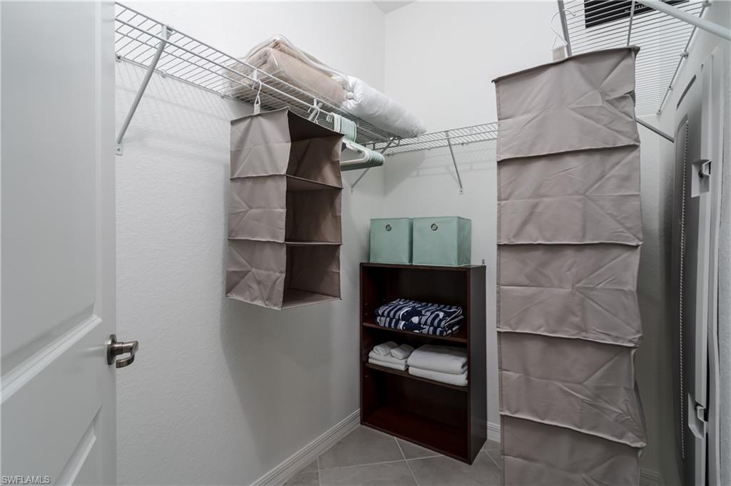 2140 Dragonfruit Way Naples, FL 34120 - Photo 17 of 35 a view of storage and utility room