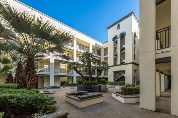 a building view with couches in front of building