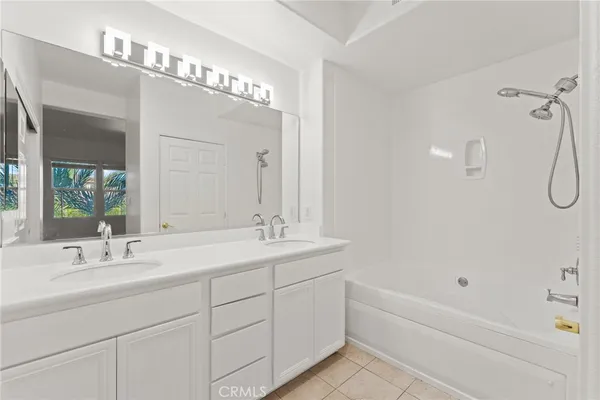 a bathroom with a toilet and shower