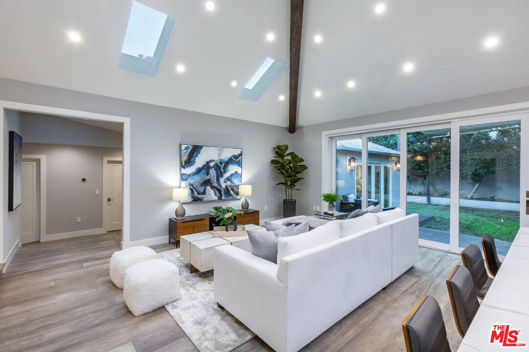 10700 Lindbrook Drive Los Angeles, CA 90024 - Photo 10 of 42 a living room with furniture and a large window