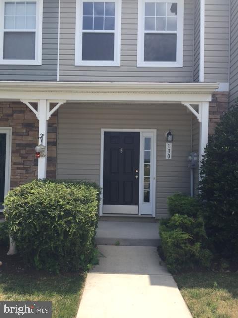 130 Nob Hill Road Dover, DE 19901 - Photo 1 of 14 a front view of a house