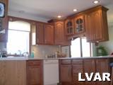 5950 Valley View Court Slatington, PA 18080 - Photo 13 of 15 a kitchen with a window a sink and a counter top space