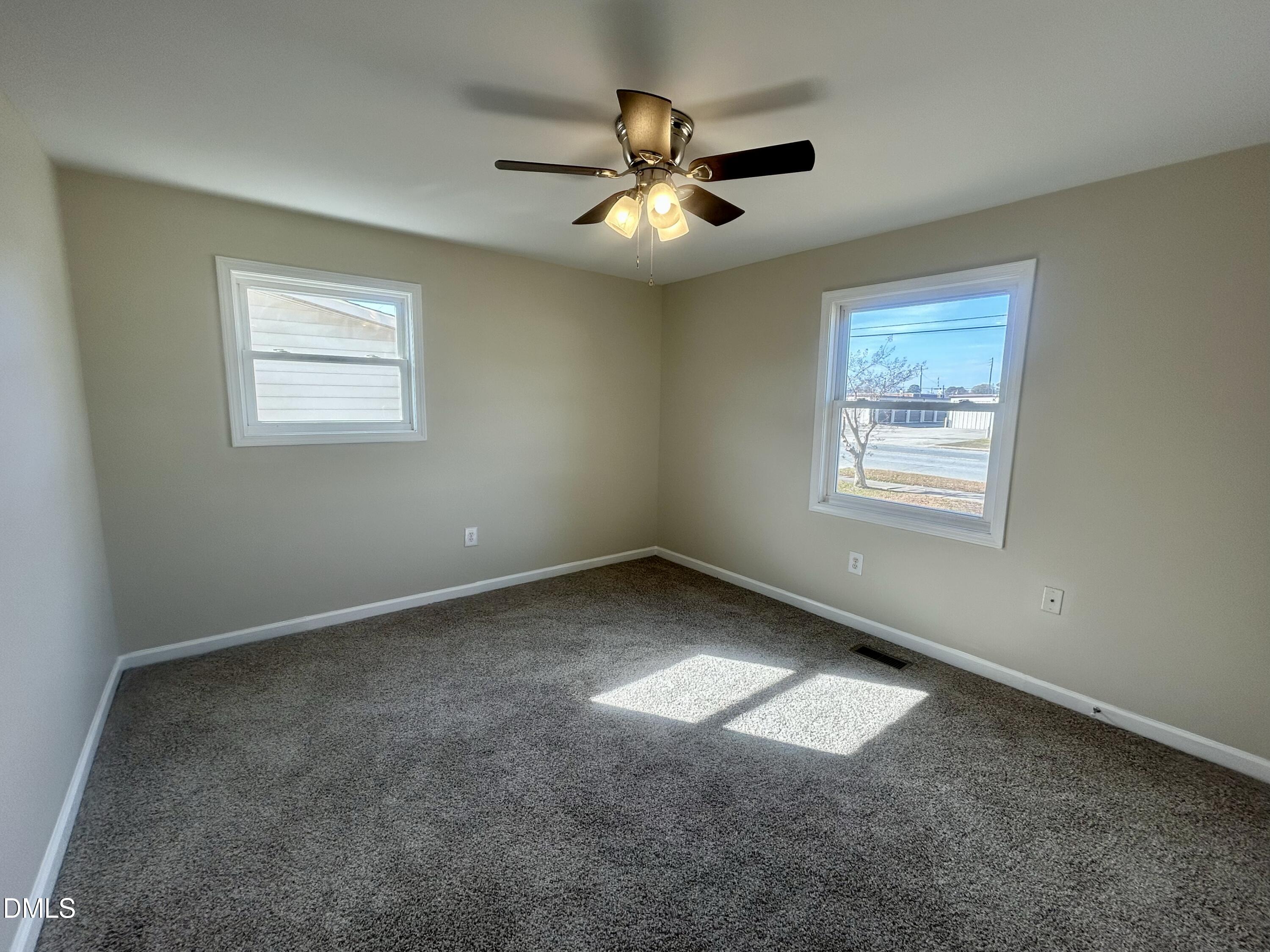 403 South Market Street Benson, NC 27504 - Photo 15 of 18 a view of an empty room with a window