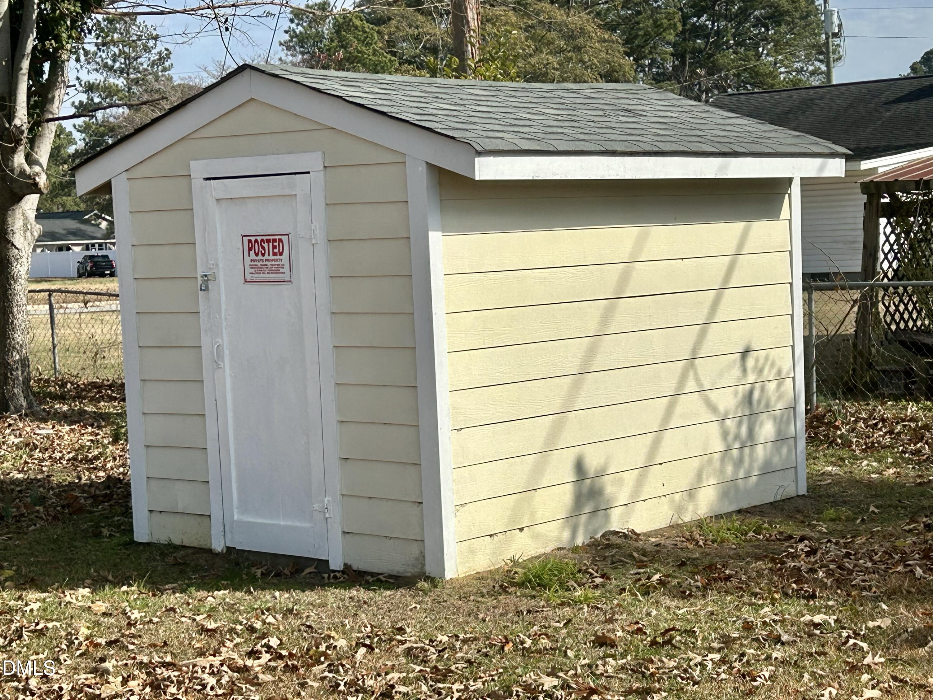 403 South Market Street Benson, NC 27504 - Photo 18 of 18 a view of a wooden house