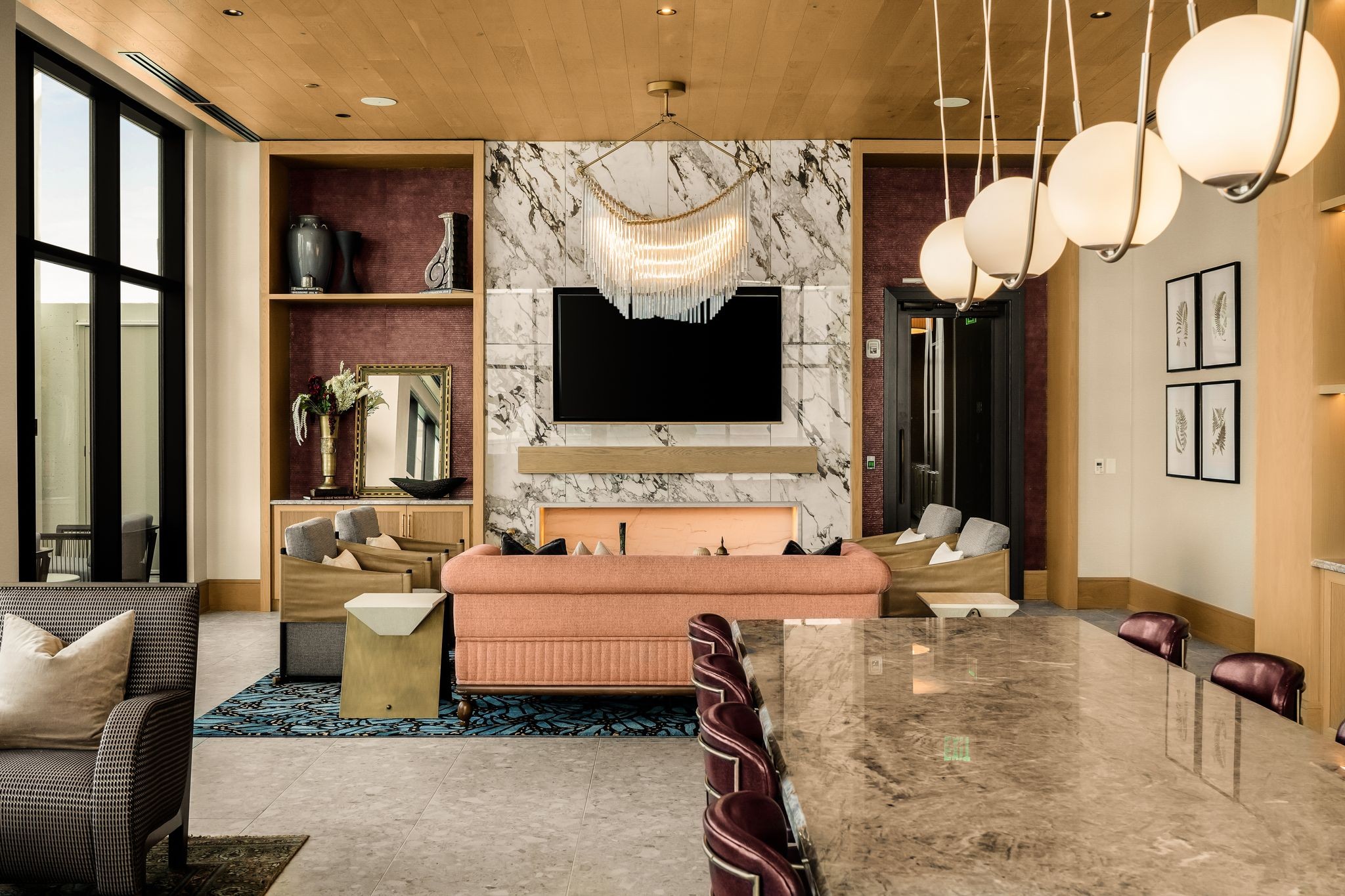 930 Commerce Street, Unit 9 Nashville, TN 37203 - Photo 18 of 40 a living room with furniture a flat screen tv and a fireplace